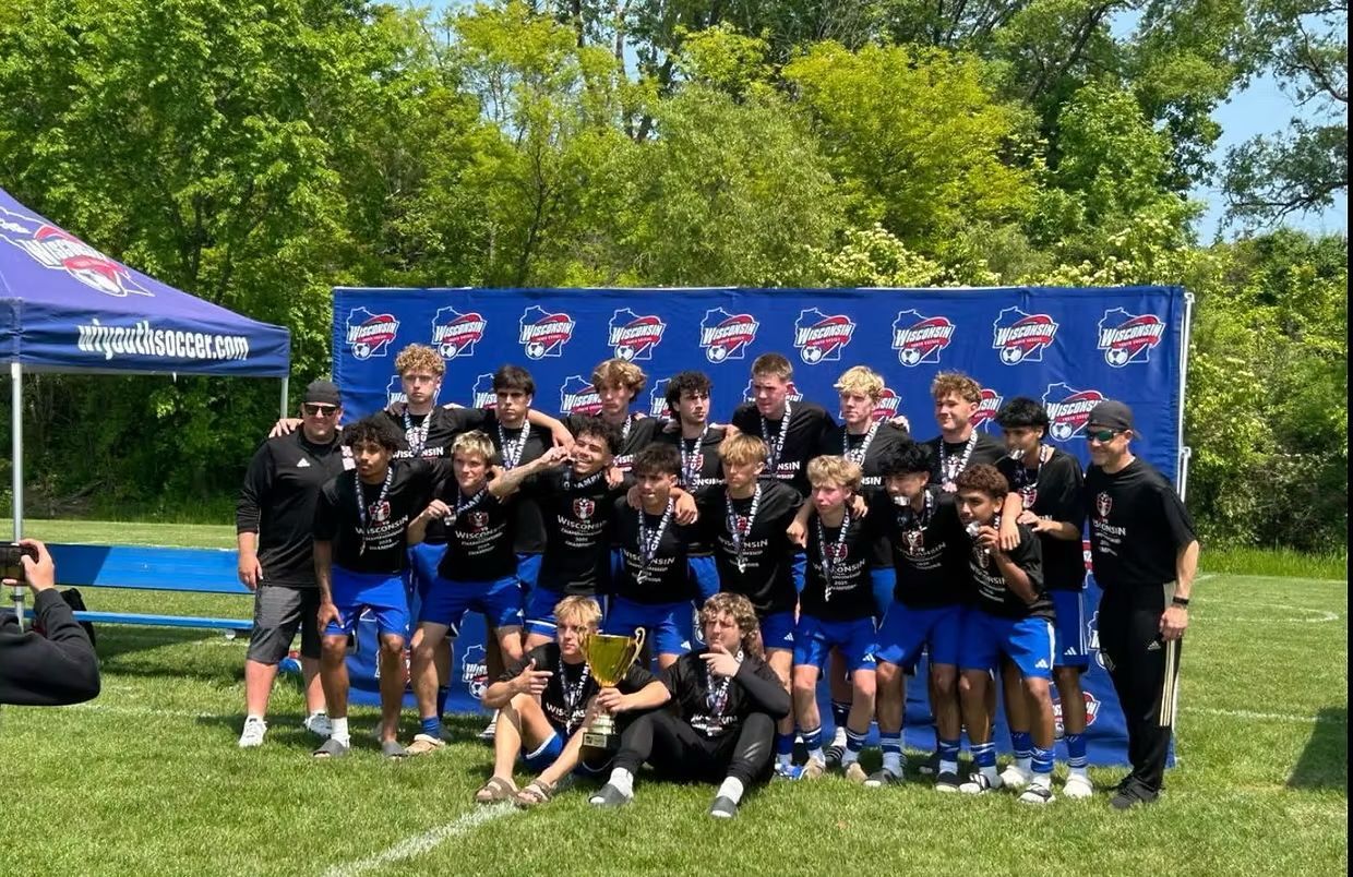 Croatian Eagles Soccer Club team with a trophy