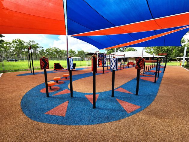 Playground with coloured soft fall surface