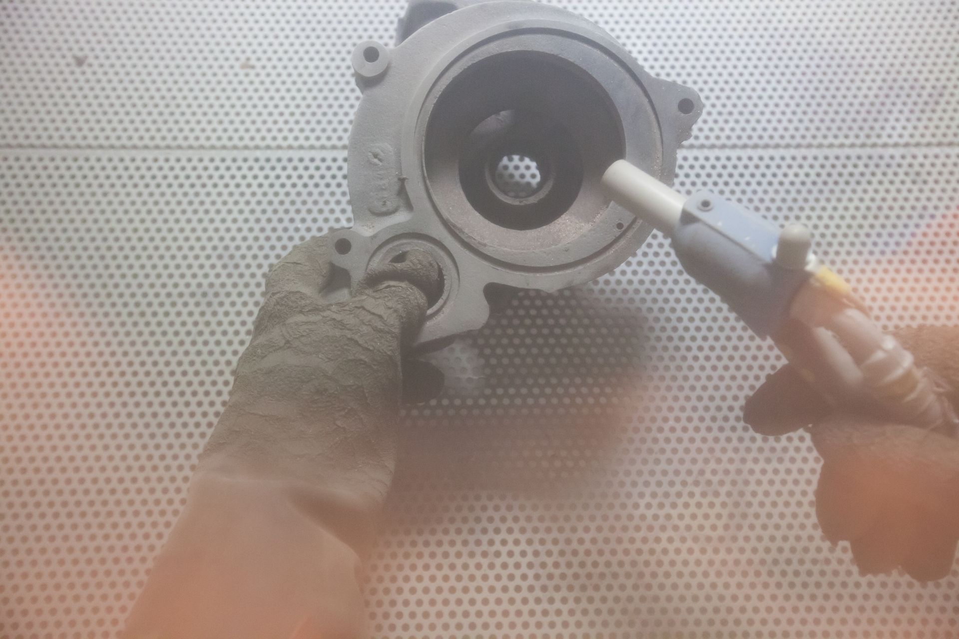 Sand blasting metal