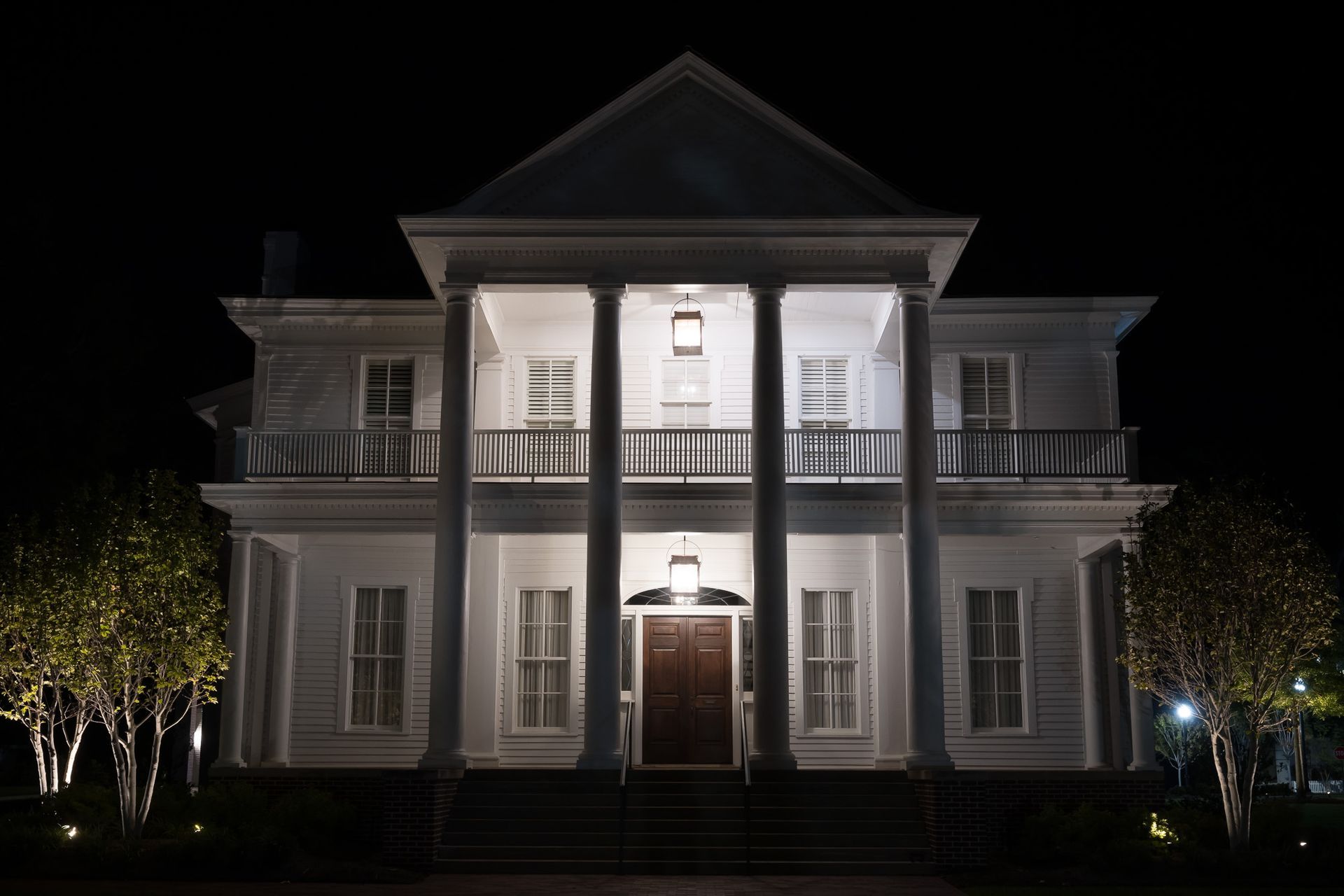The Big House photo from the front at night.