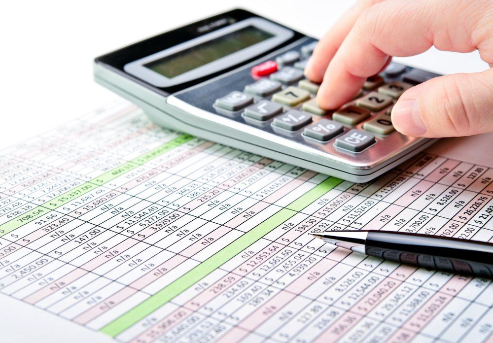 Spreadsheet With Pen and Calculator — Loans in Warners Bay, NSW