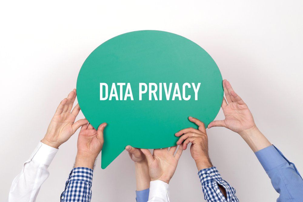 Group of People Holding Data Privacy Sign — Loans in Warners Bay, NSW