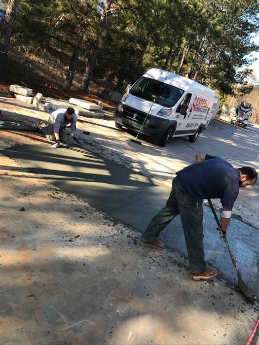 Applying Cement In Pipe Line — McDonough, GA — Express Plumbing & Septic