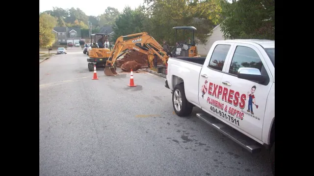 Backhoe and Pickup Truck — McDonough, GA — Express Plumbing & Septic