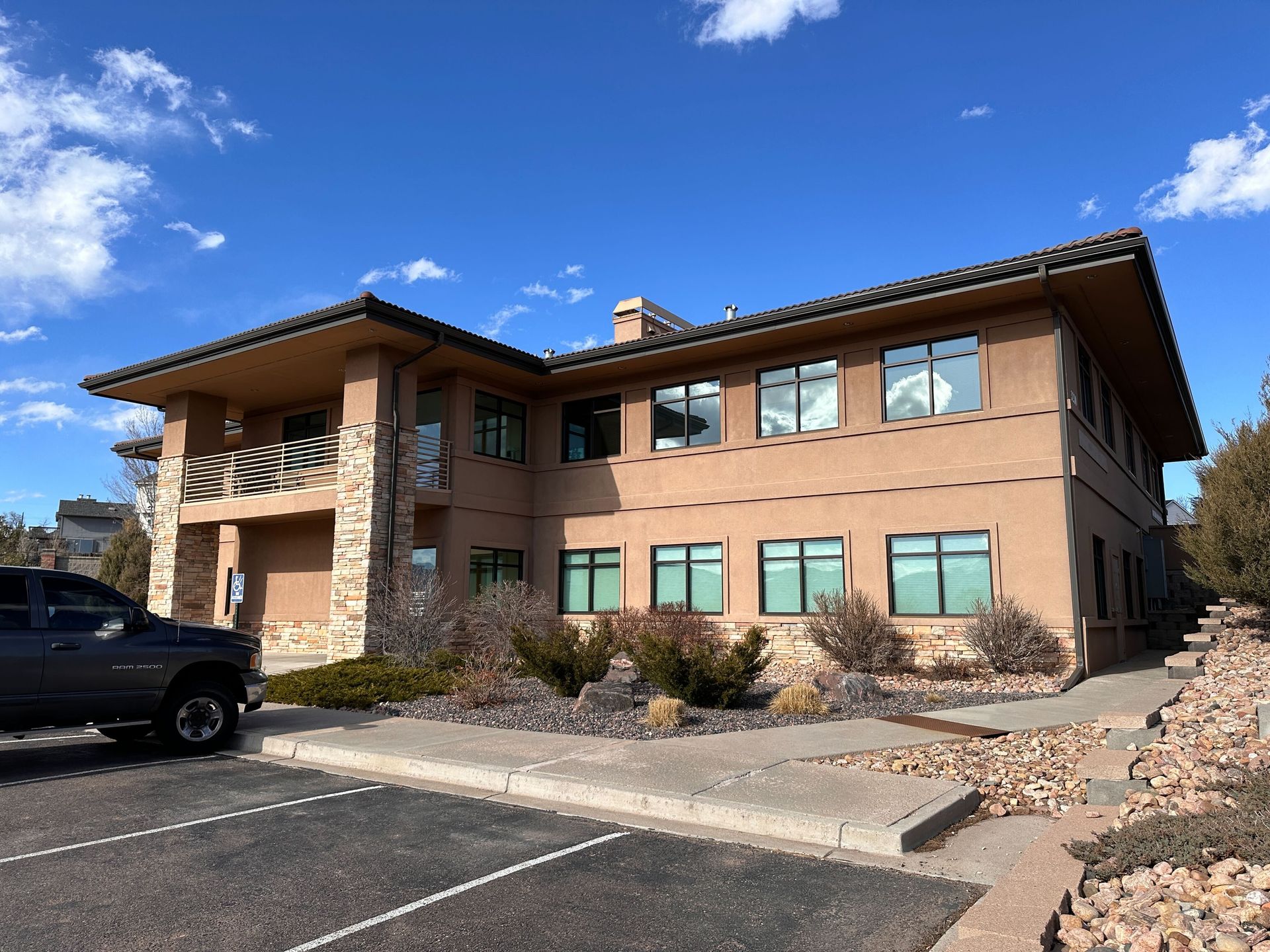 Exterior view of Luxe Cosmetic Studios building, showcasing a welcoming and professional space for beauty and wellness professionals.