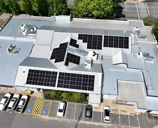 Aerial View of a Building With a Silver Roof — Des Mullins Electrical & Solar in Wagga Wagga, NSW