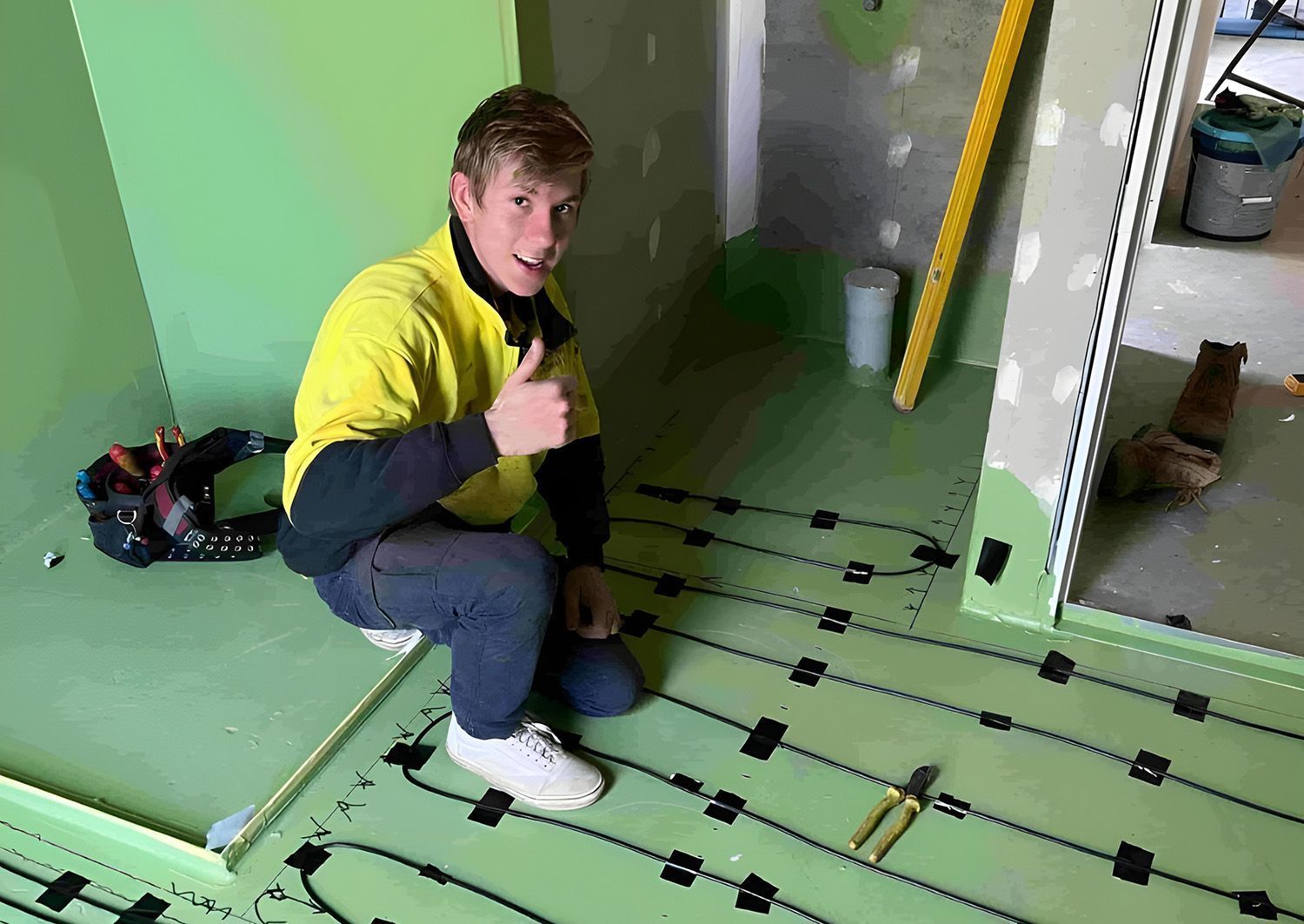 Construction Worker Gives Thumbs Up — Des Mullins Electrical & Solar in Wagga Wagga, NSW