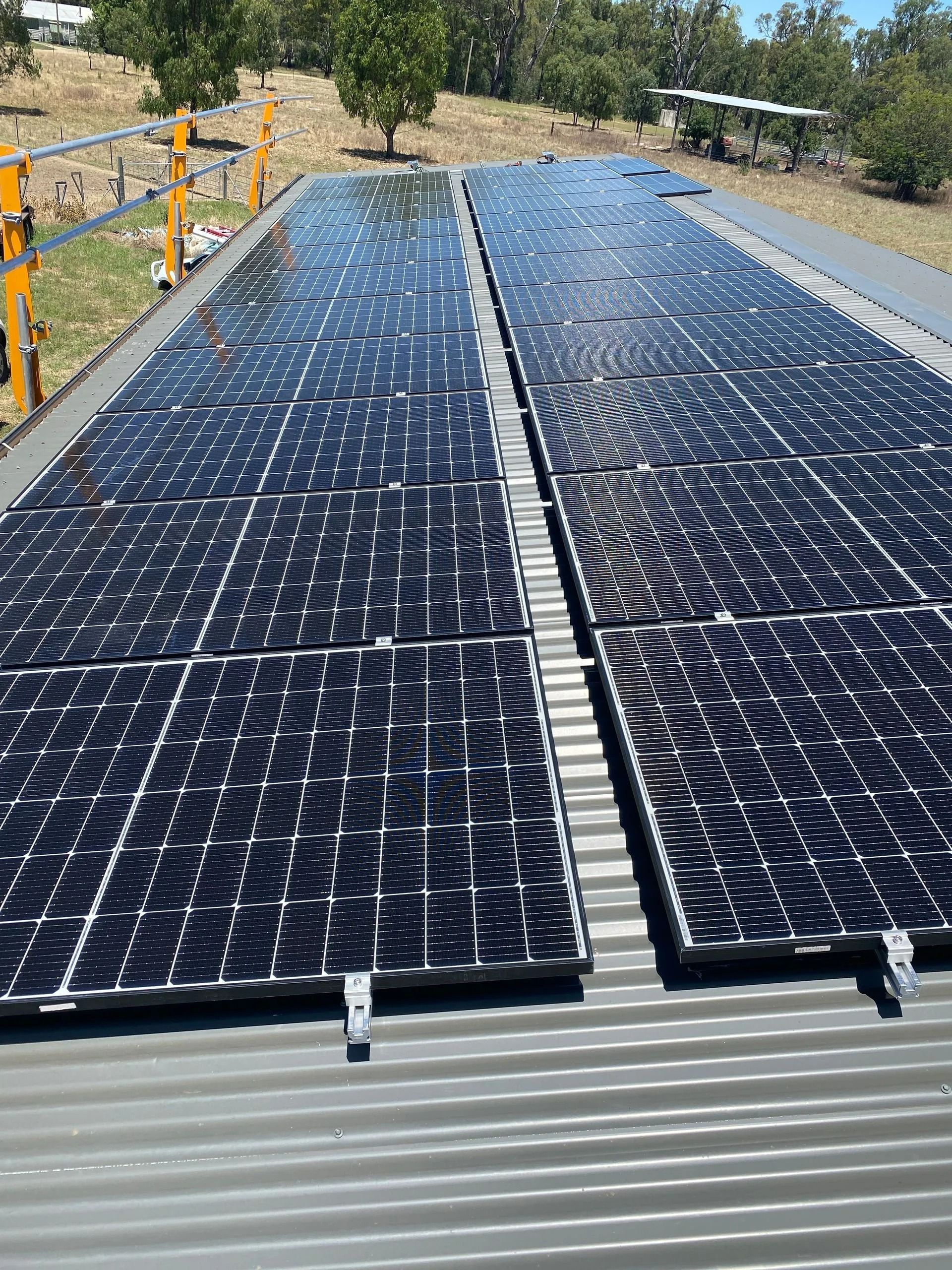 Solar Panels on a Corrugated Metal Roof — Des Mullins Electrical & Solar in Wagga Wagga, NSW