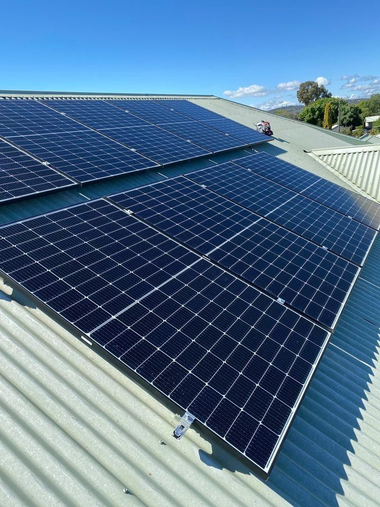 Solar Panels Installed on a Corrugated Metal Roof — Des Mullins Electrical & Solar in Wagga Wagga, NSW