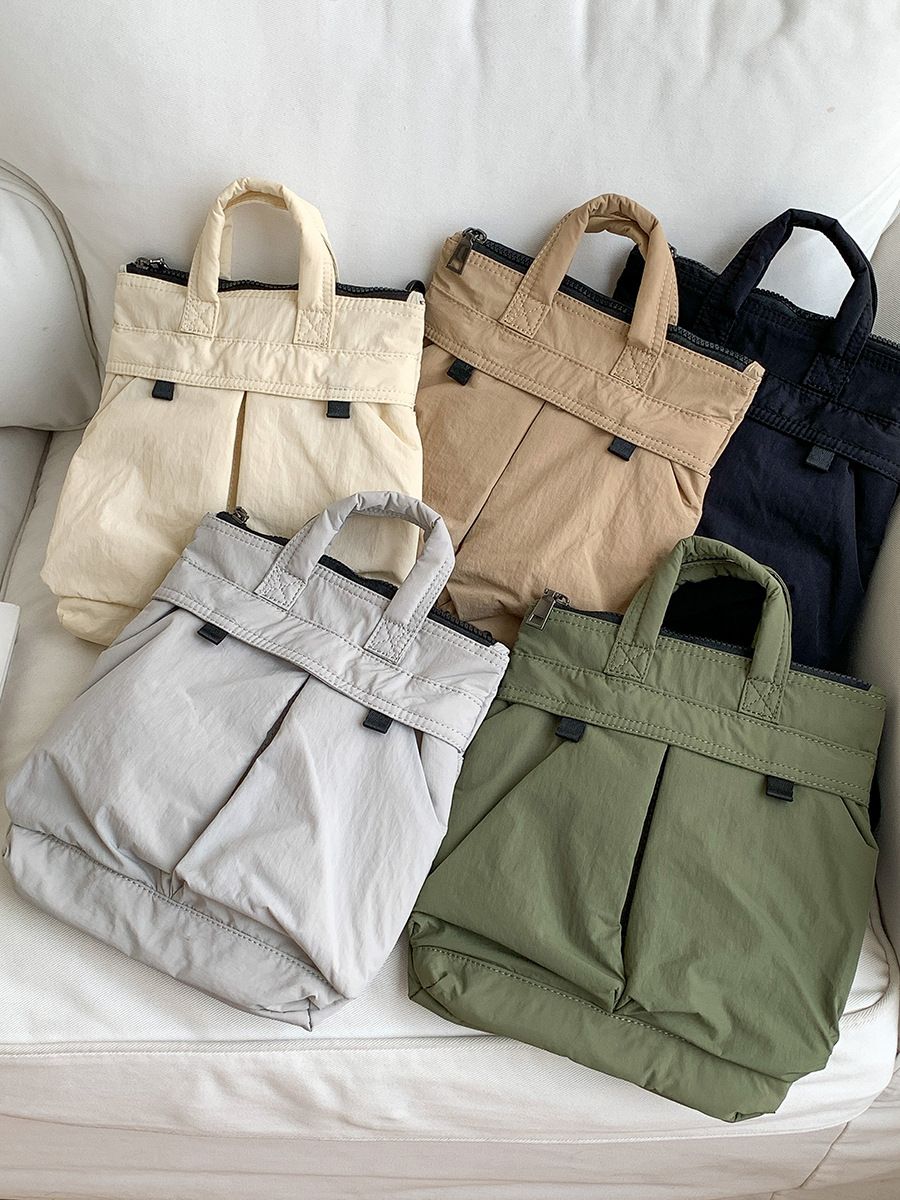 輕量防潑水尼龍斜背包 多功能手提托特包 單肩側背郵差包 男女通用 休閒時尚大容 雙口袋側背包 單肩包