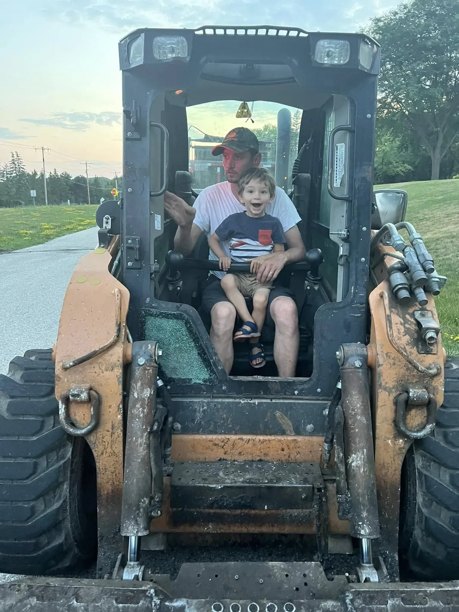 Logan Morawski with his father learning the ropes at Purpose Contracting Asphalt.