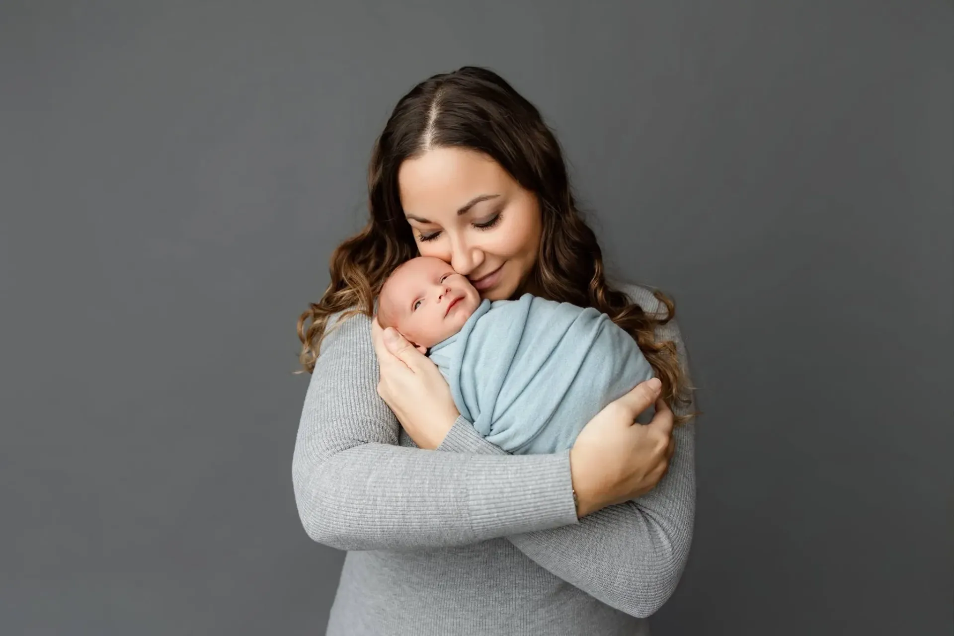 Katie Morawski, Co-Owner of Purpose Contracting Asphalt, with her newborn.
