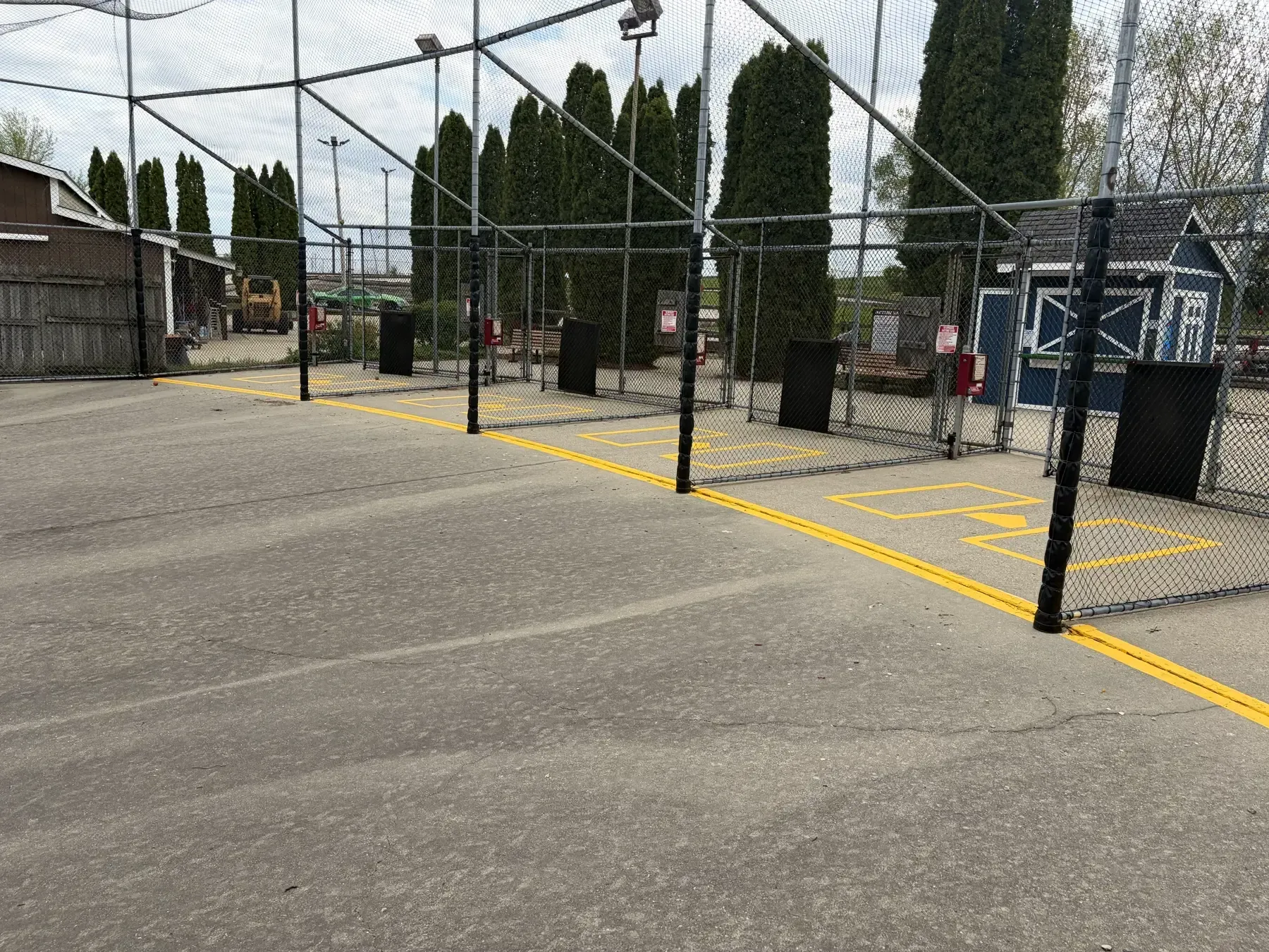 Freshly striped batting area at a family Theme park.