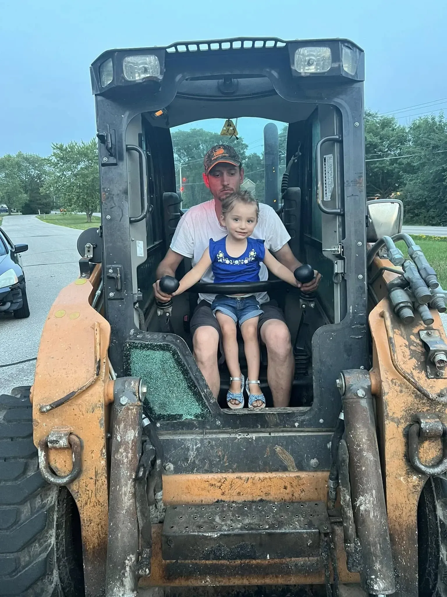Alexis Morawski, with her father learning the ropes at Purpose Contracting Asphalt.