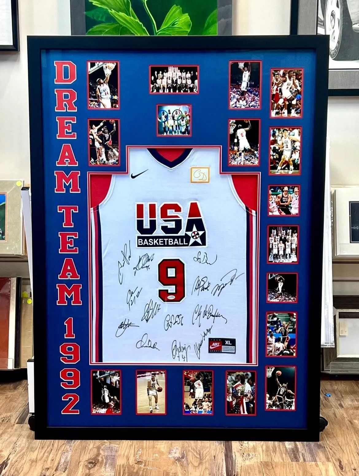 Framed USA basketball jersey collage with red-and-blue mat and “Dream Team 1992” text
