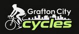 Logo for Grafton City Cycles featuring a cyclist, city skyline, and green "cycles" text on a black background.  &mdash; Grafton City Cycles in Grafton, NSW