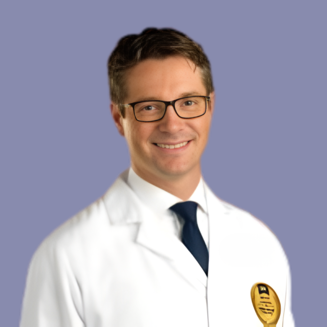 Smiling doctor in a white lab coat and tie against a purple background
