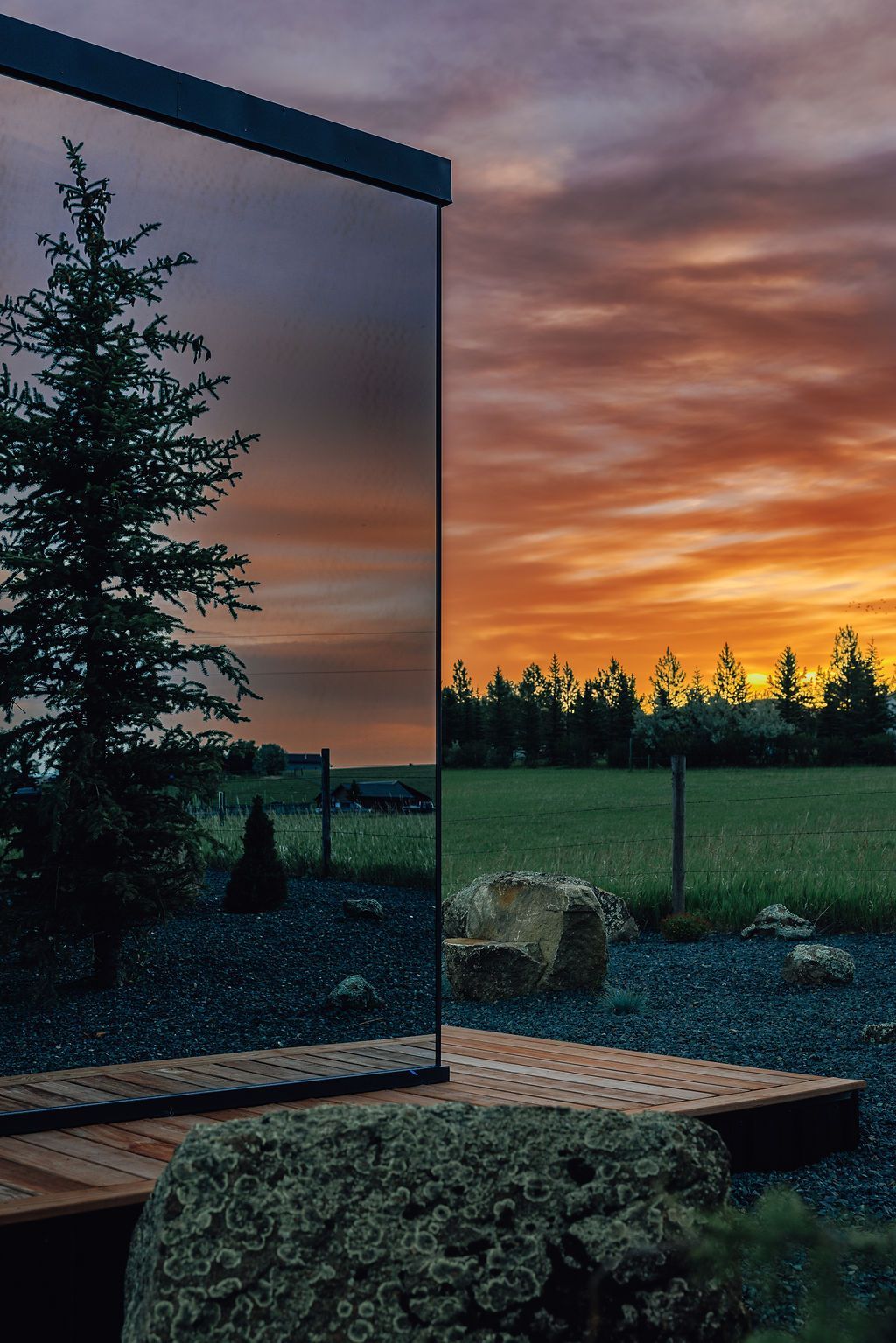 Golden Ranch Montana airbnb mirror cabin at sunset