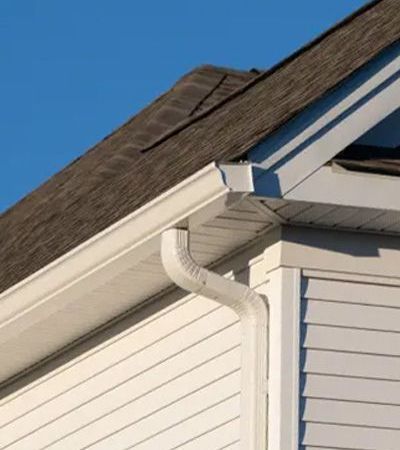 Commercial flat roof with chimneys and other structures