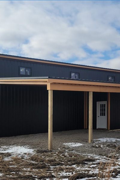 Modern House Garage with new roof and metal siding