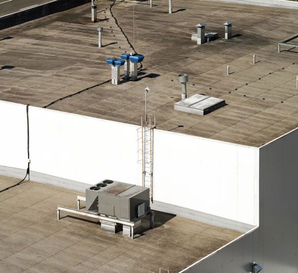 A flat commercial roof installation.