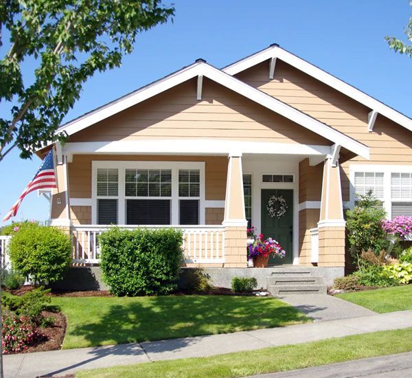 A home in Marysville, Ohio with new yellow siding installed by Allstate Exteriors