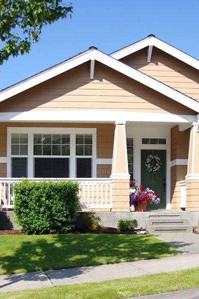 A home in Marysville, Ohio with new yellow siding installed by Allstate Exteriors