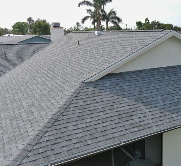Commercial flat roof with chimneys and other structures