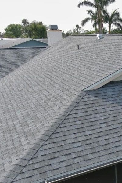 A house with a roof that has shingles on it