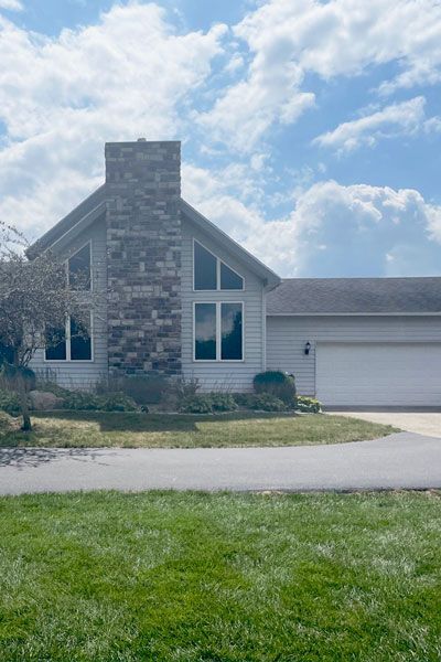 Post modern home with new roof
