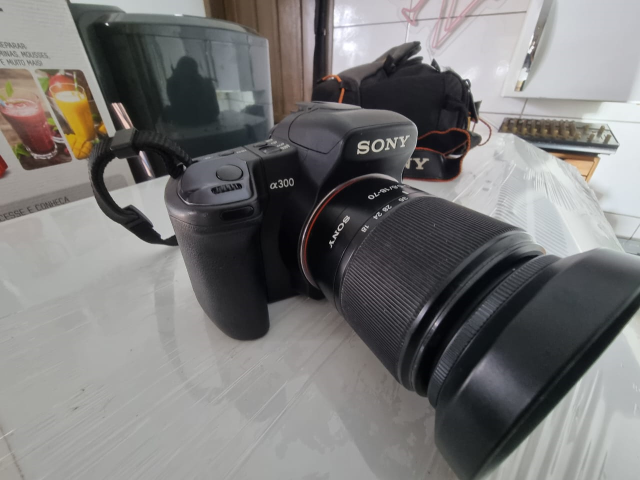 Maquina fotográfica Sony Apha 300 semi nova