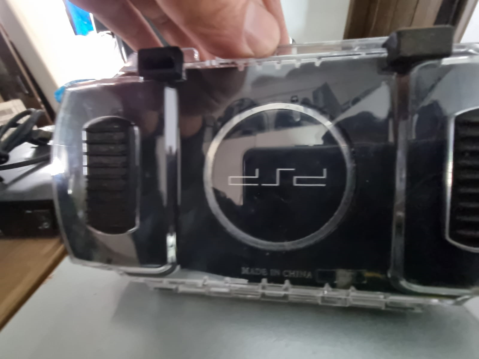 colecionaveis Sony Psp-3000 semi novo com case anti-shock, 02 jogos e bateria e carregador novos