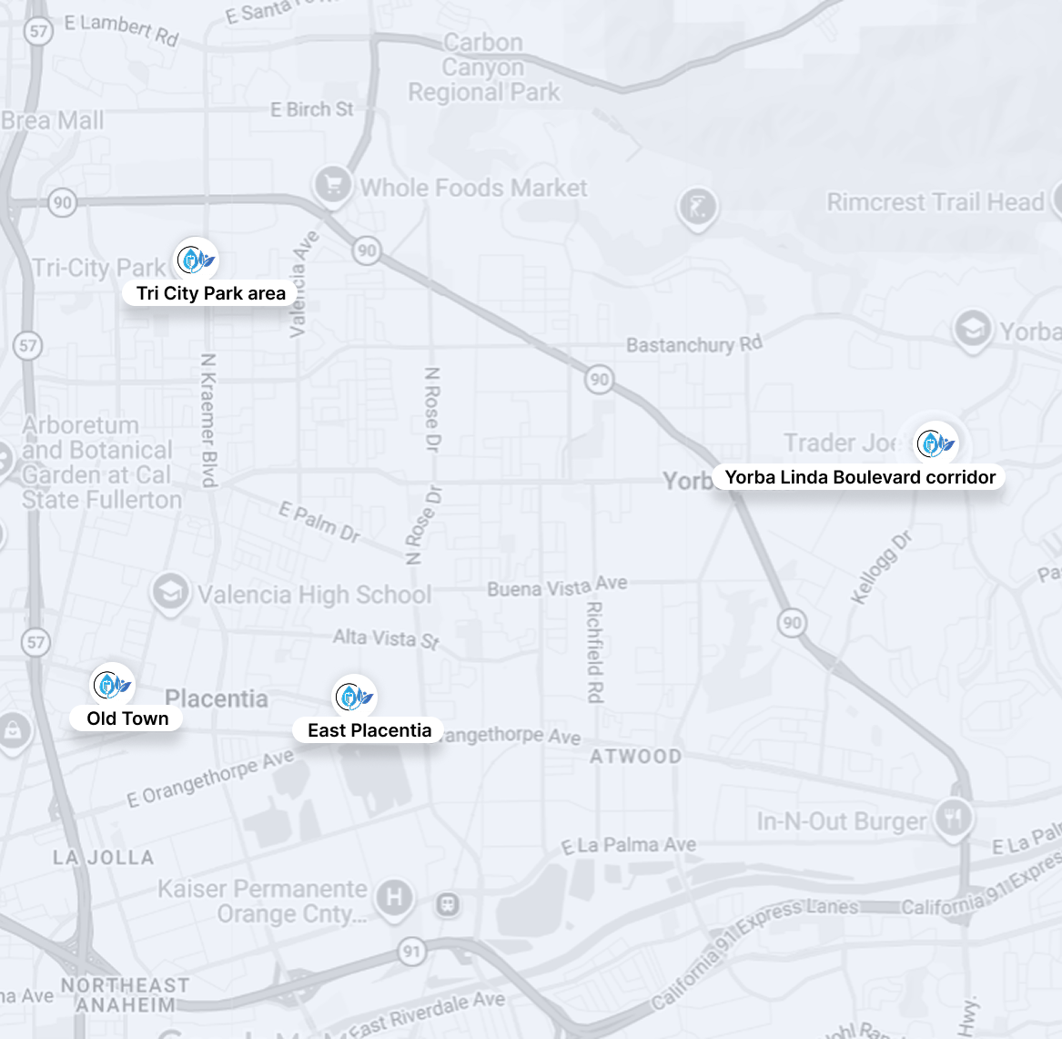 Faded map of Orange, California with labels for streets, parks, and nearby businesses.