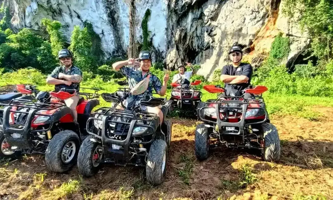 a group of people with atv in khlong son