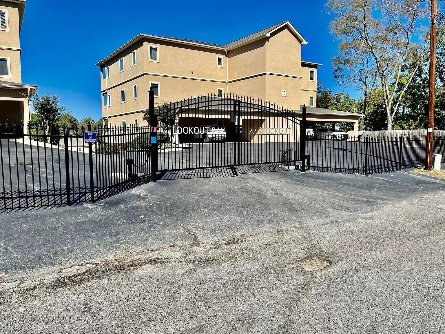 A large building with a gate in front of it.