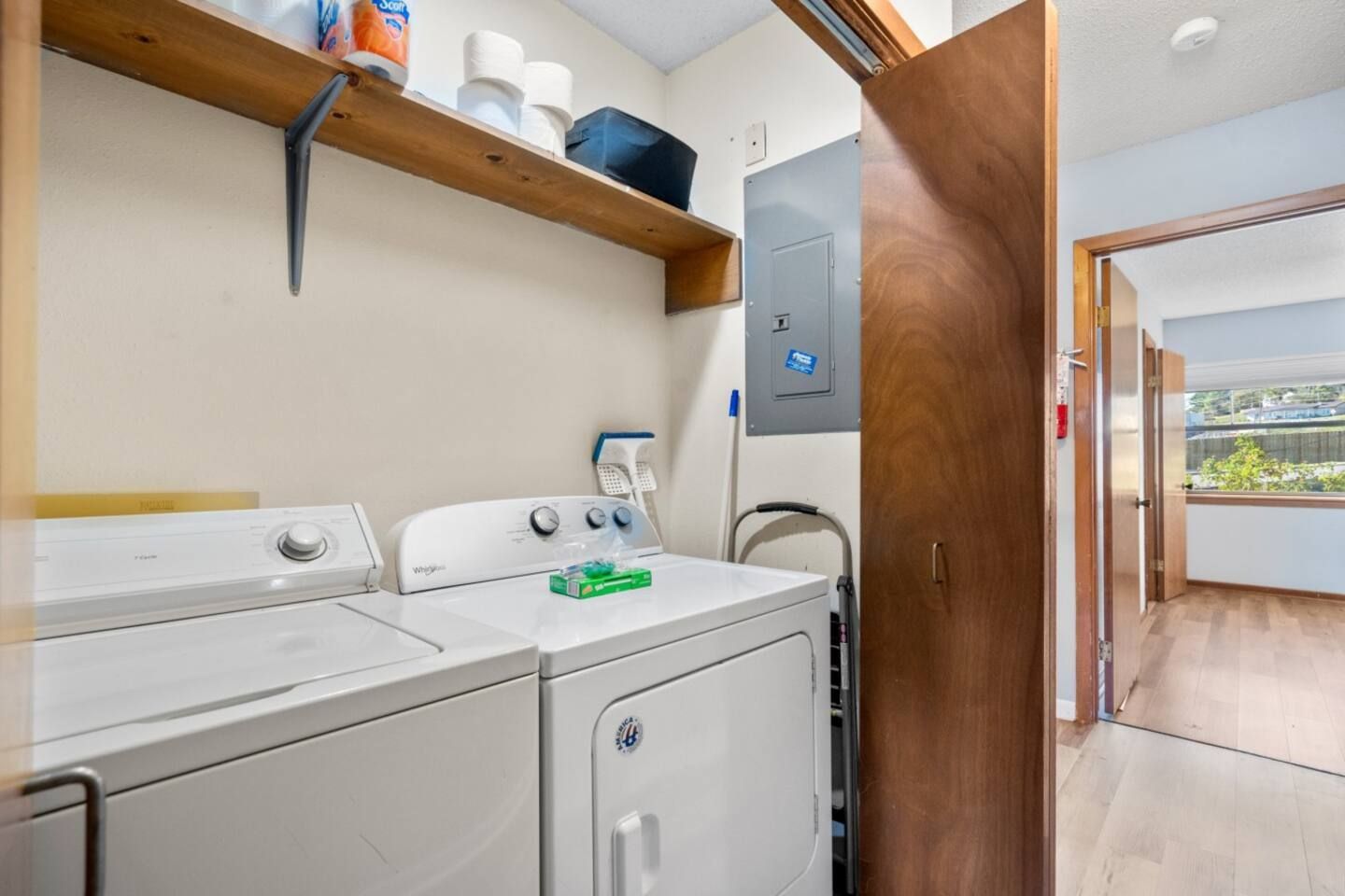 There is a washer and dryer in the laundry room.
