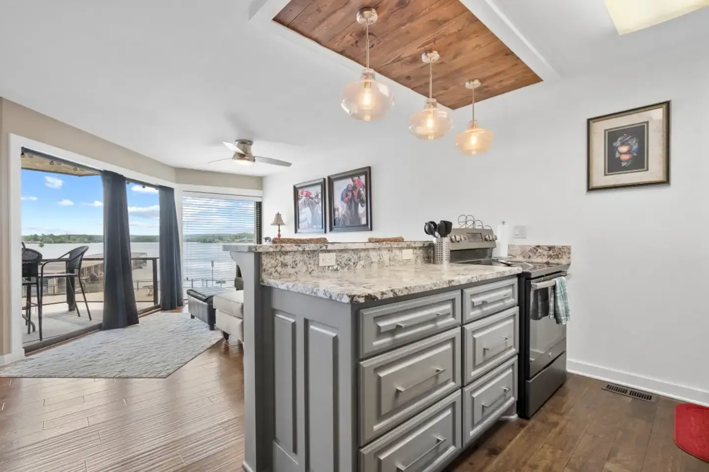 A kitchen with a large island in the middle of the room.