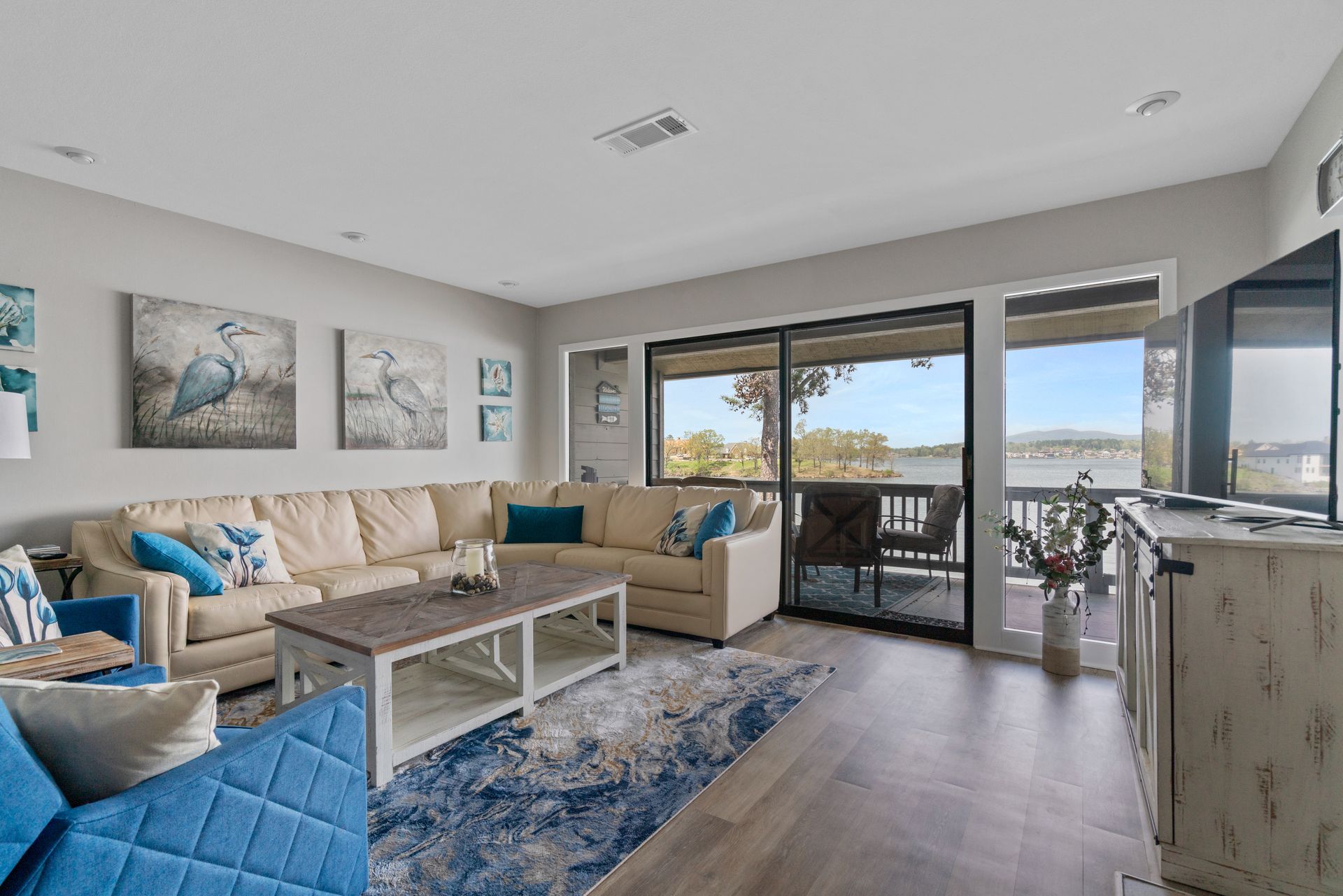 A living room filled with furniture and a flat screen tv.