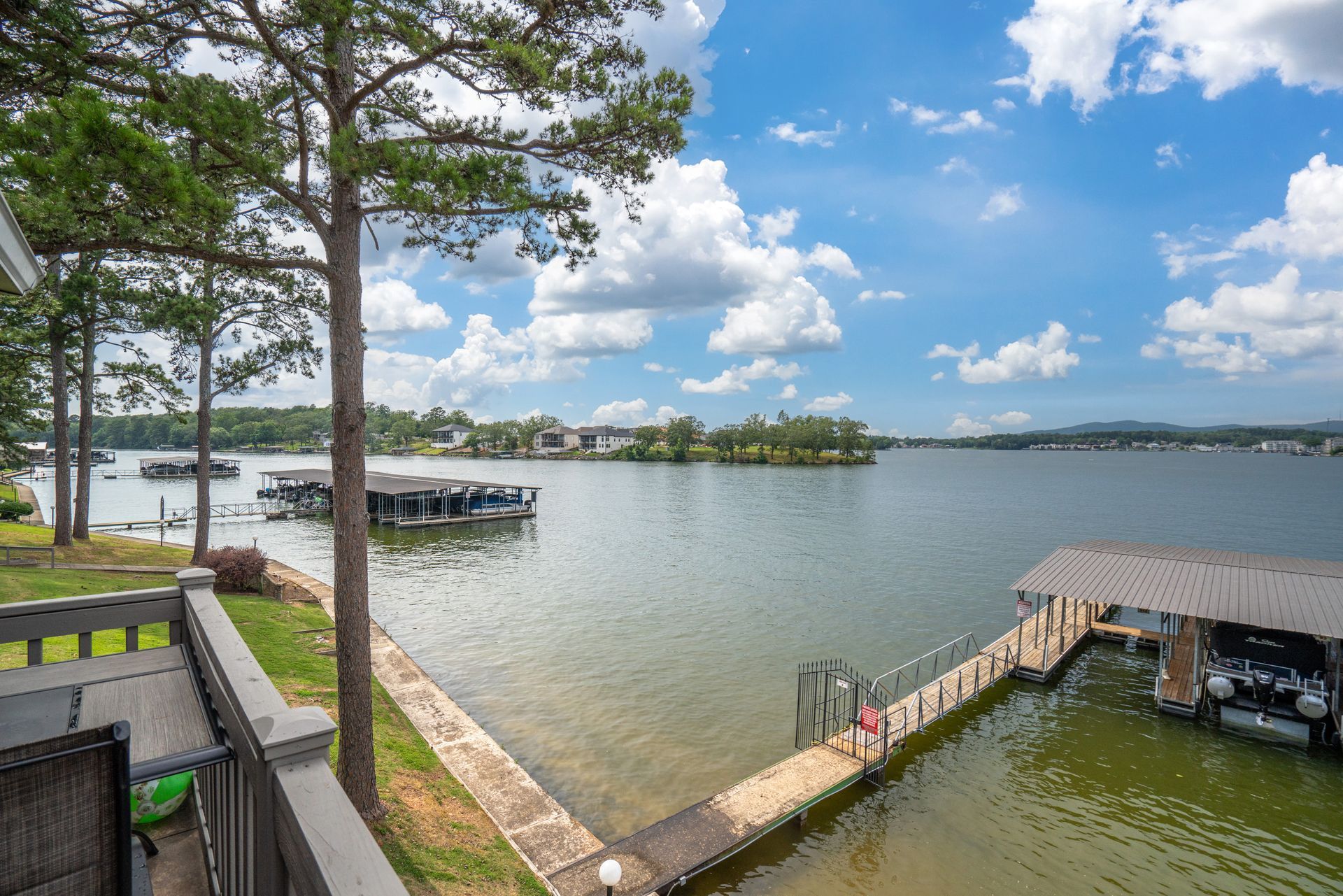 A large body of water with a dock in the middle of it.