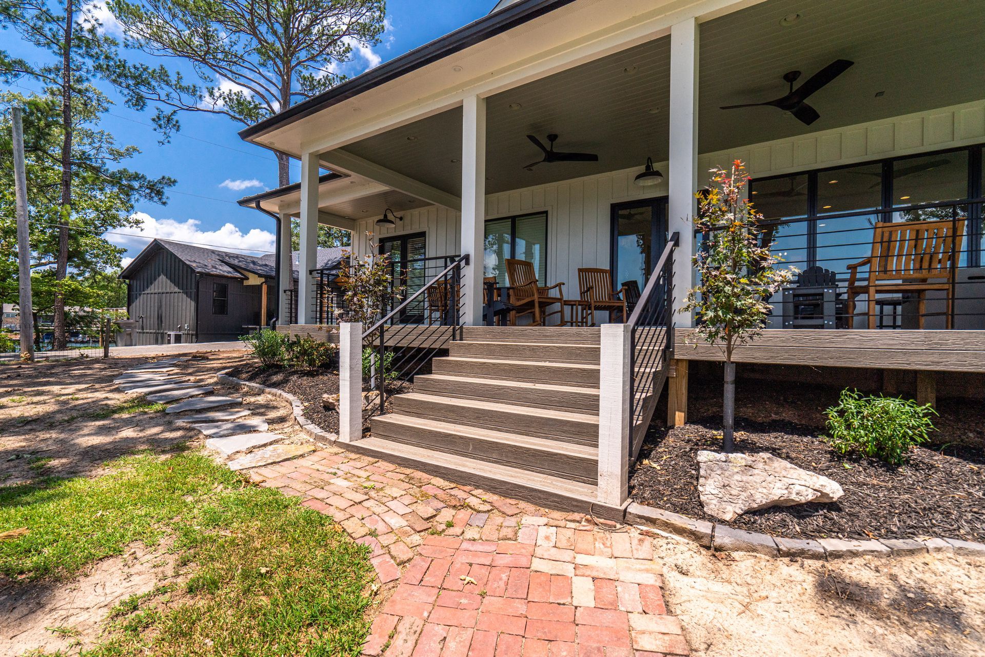 A large porch with stairs leading up to it