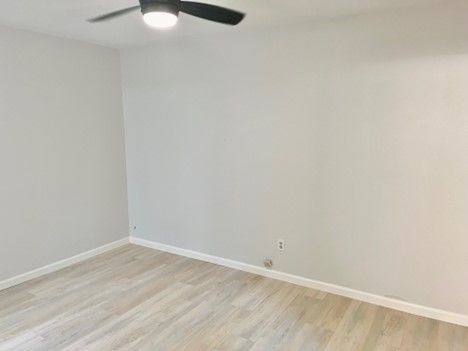 There is a ceiling fan in the room.