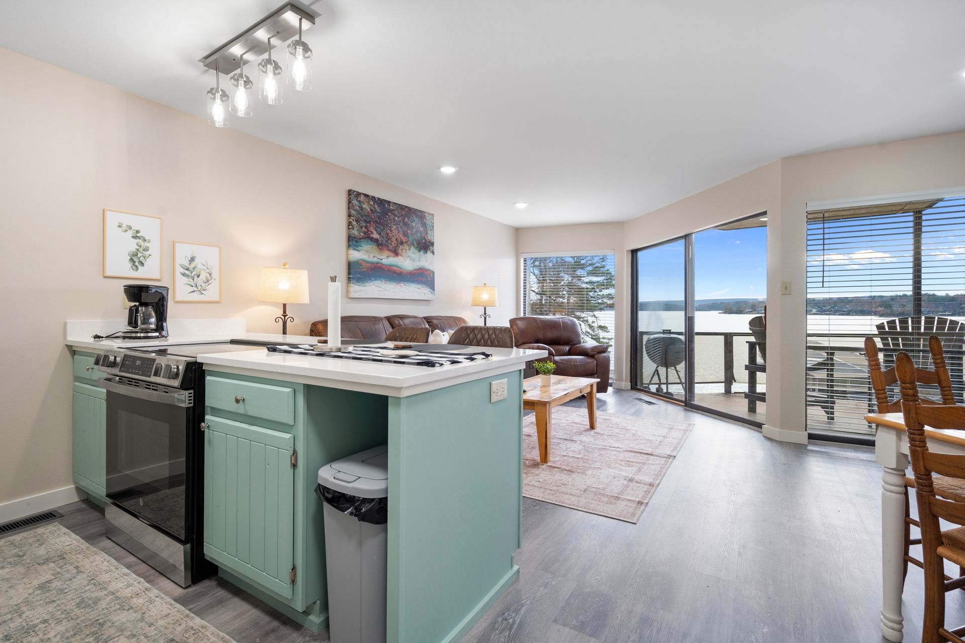 A kitchen with a large island in the middle of the room.