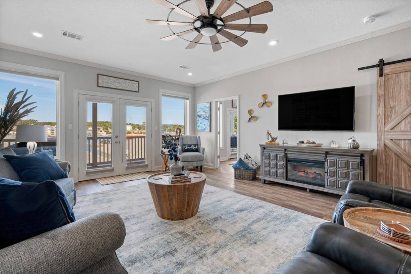 A living room filled with furniture and a flat screen tv.