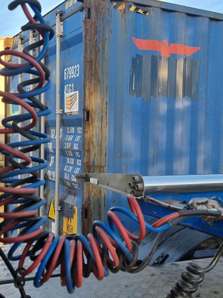 A Blue Shipping Container With a Red Eagle on It — Oz Shipping Containers in Teralba, NSW