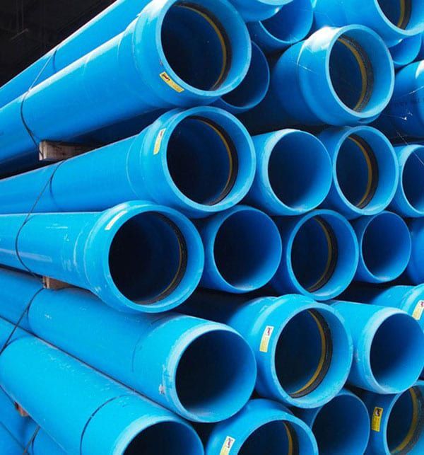 A Bunch of Blue Pipes Stacked on Top of Each Other — Taree Pool Supplies in Taree, NSW