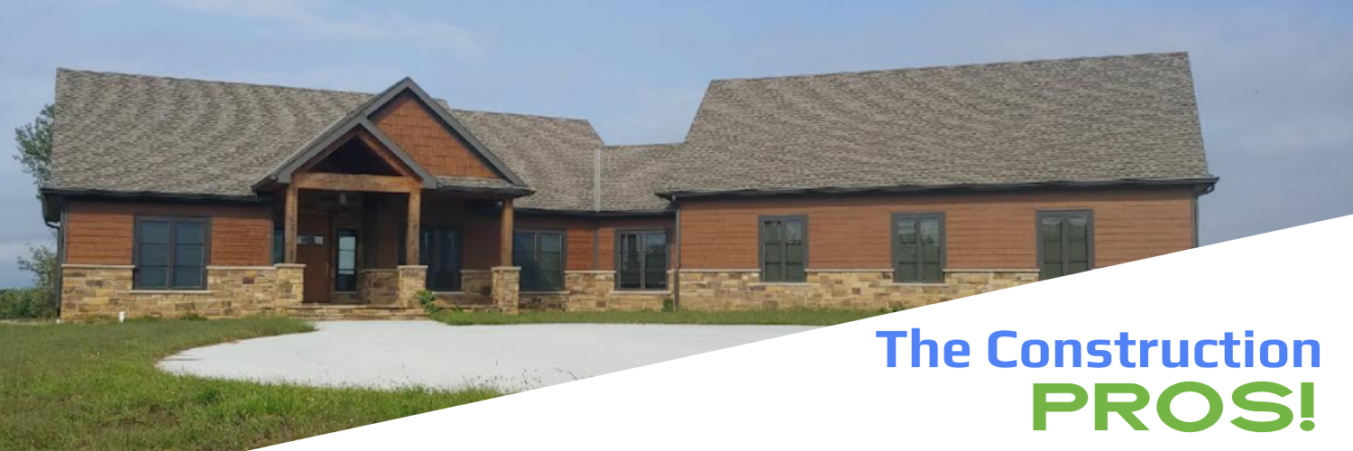 A modern rustic home featuring wood siding, stone base, and a covered entryway, with The Construction Pros logo below.