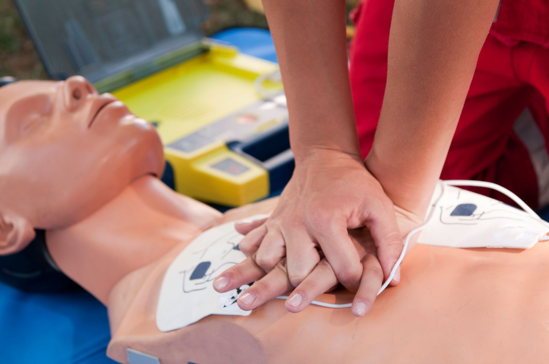 Practicing defibrillator CPR procedure
