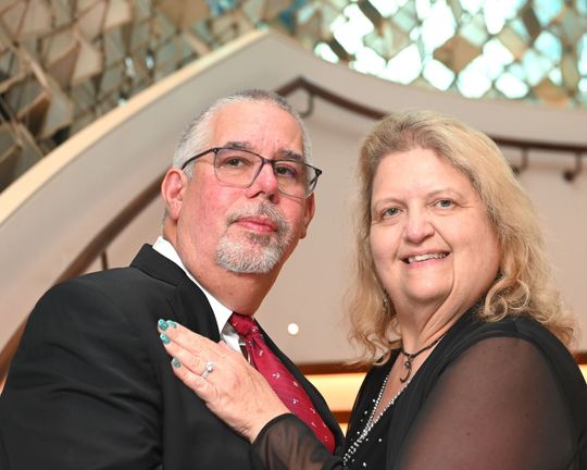 Mark and Kim Zielberg, cruise travel advisors with Adventures By K and M, aboard a Royal Caribbean cruise ship
