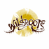 Wildroots logo with brown text over a gold sunburst background, roots extending from the word.