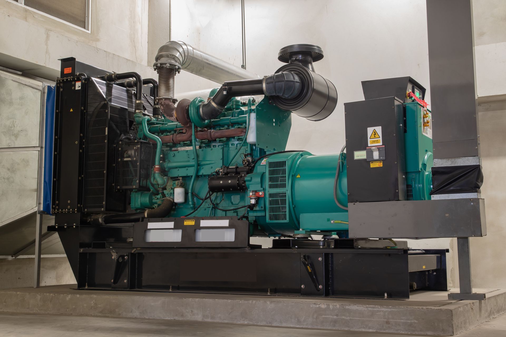 Industrial power generator supported by custom wiring harnesses and cable assemblies for reliability.